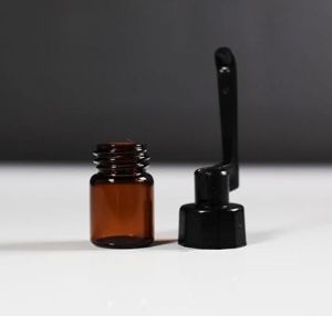 Medium Amber Glass snuff vial with spoon